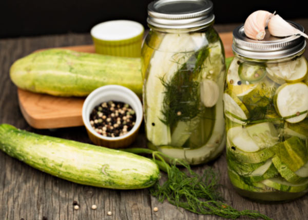 cucumbers, dill, garlic, and mason jar