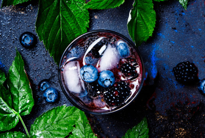 blueberries and blackberries with mint