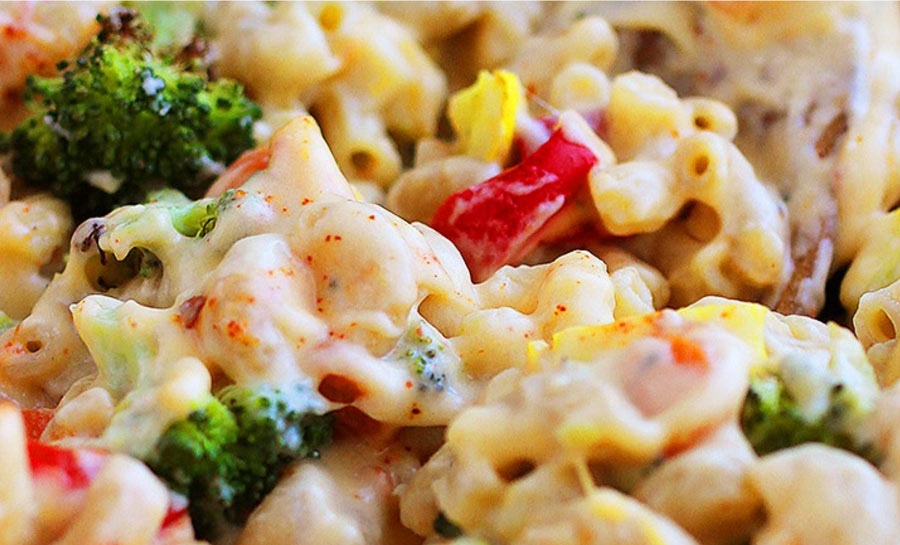 creamy dish of vegetables, cheese, and pasta